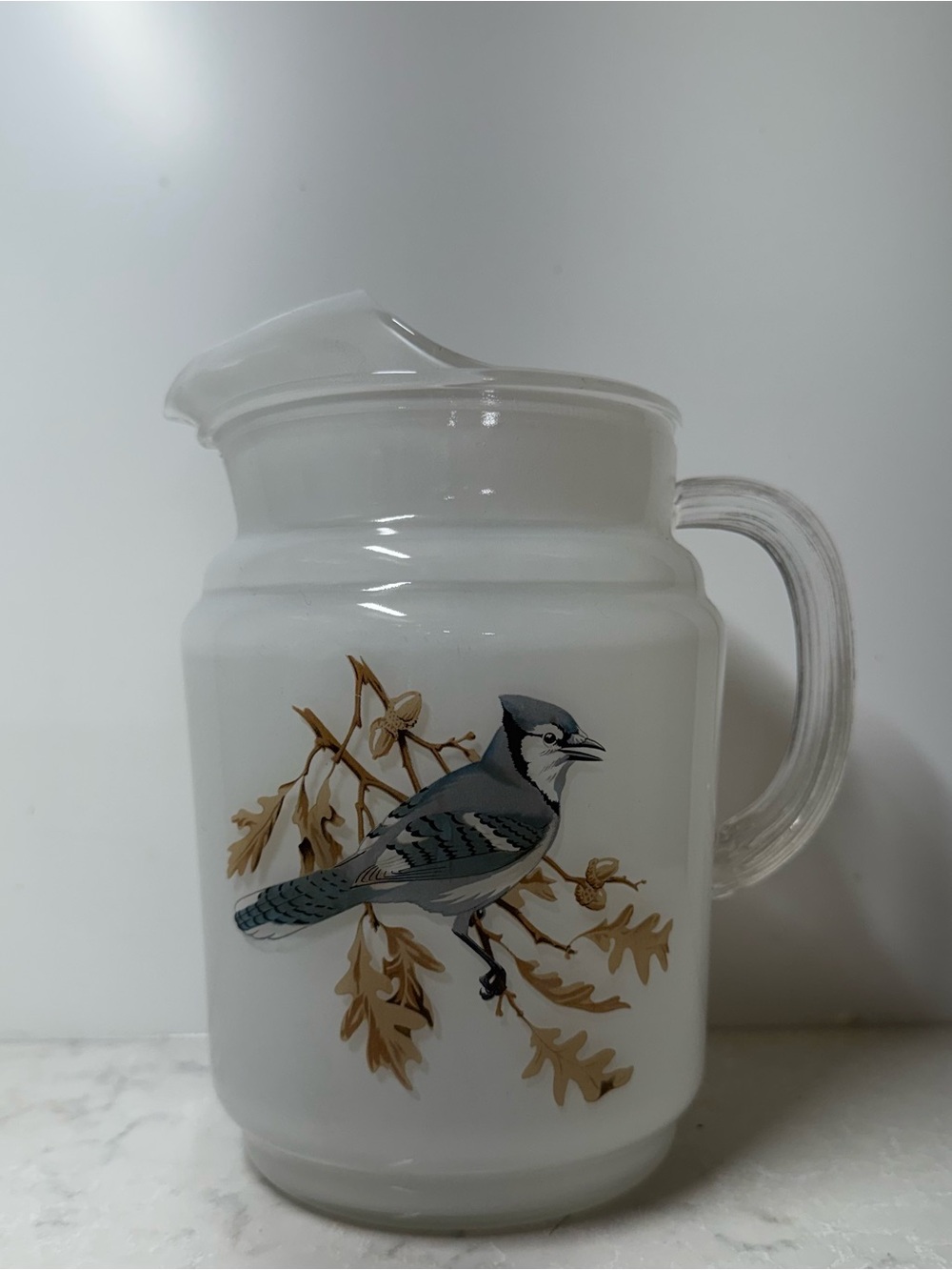 Vintage White Glass Pitcher with Blue Jay & Oak Motif